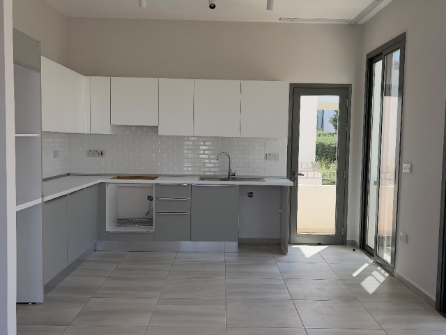 2+1 ground floor flat with garden in Kyrenia Alsancak Kıbrıs Town site with 24/7 security. 05338403555