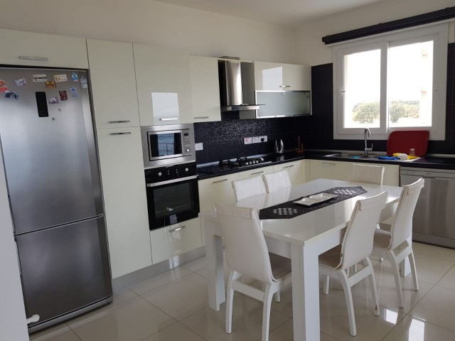 Fully furnished 3 + 1 apartment for sale in a beachfront complex in Famagusta Gülserende