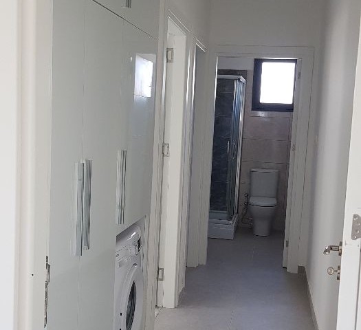 Yenişehir bölgesinde merkezde kiralık  full eşyalı yeni 2+1  daire