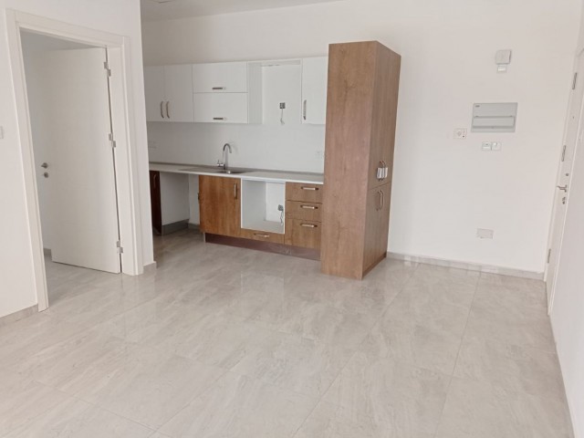 85M2 TURKISH OPPORTUNITY APARTMENT ON THE GROUND FLOOR IN THE SMALL KAYMAKLI DISTRICT (2 +1) ** 