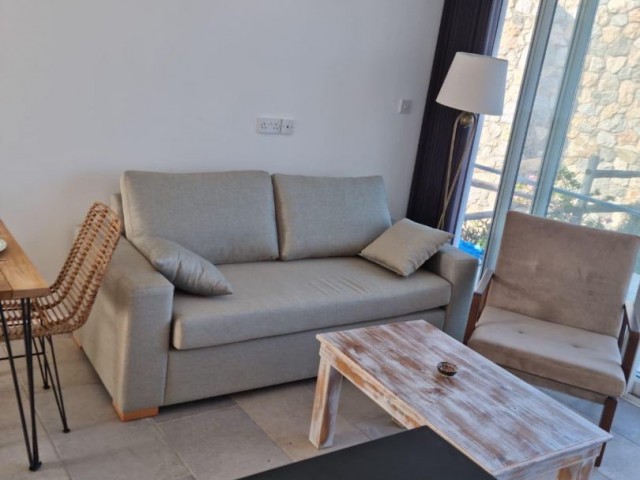 GIRNE, ESENTEPE - BEAUTIFUL 1+1 GARDEN APARTMENT LOCATED IN A SEAFRONT COMPLEX