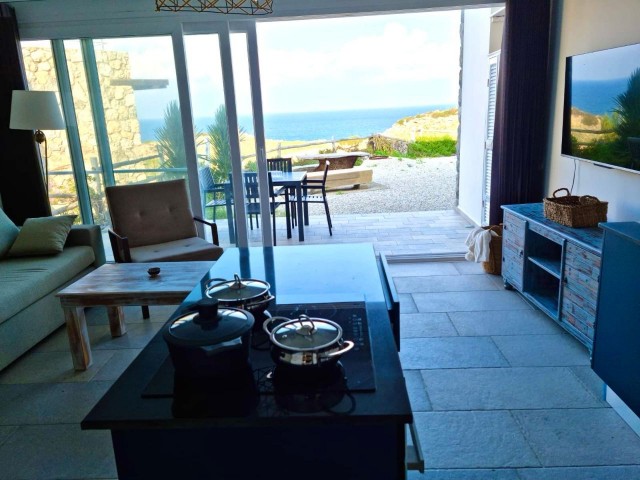 GIRNE, ESENTEPE - BEAUTIFUL 1+1 GARDEN APARTMENT LOCATED IN A SEAFRONT COMPLEX