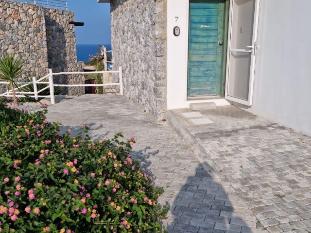 GIRNE, ESENTEPE - BEAUTIFUL 1+1 GARDEN APARTMENT LOCATED IN A SEAFRONT COMPLEX