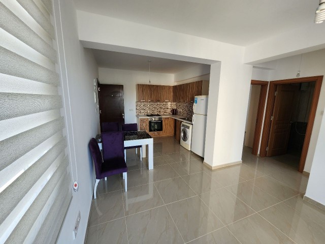 Opportunity for sale in Alsancak 2+1 apartment in a complex with pool