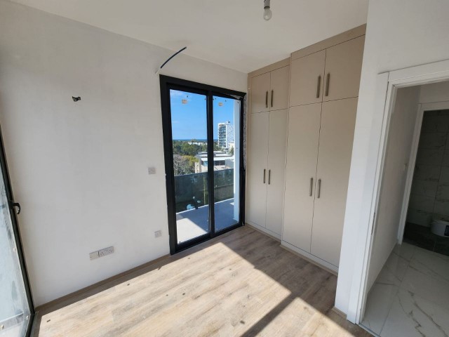 WOHNUNG ZU VERKAUFEN GİRNE CENTER 2+1 LOFT