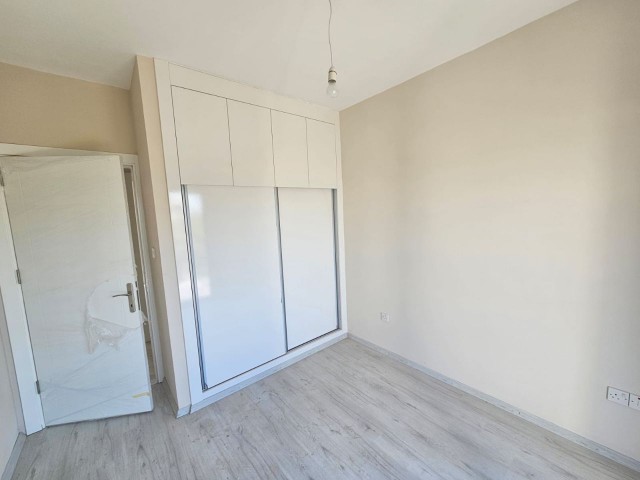 GIRNE ALSANCAK 2+1 GROUND FLOOR FLAT WITH GARDEN FOR SALE (050823Mr02)