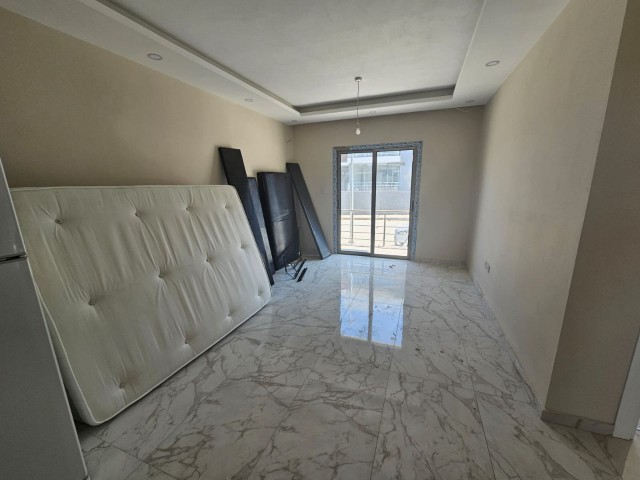 GIRNE ALSANCAK 2+1 GROUND FLOOR FLAT WITH GARDEN FOR SALE (050823Mr02)