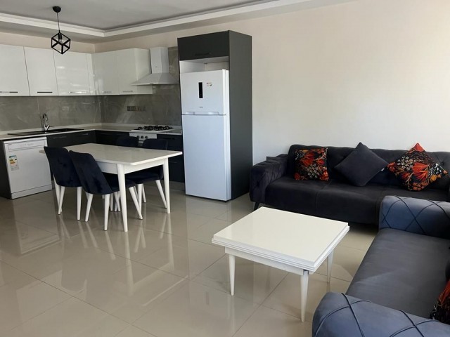 2+1 flat for rent in Kyrenia center with open pool, dues included, Turkish bath, gym, massage included