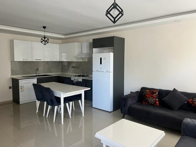 2+1 flat for rent in Kyrenia center with open pool, dues included, Turkish bath, gym, massage included