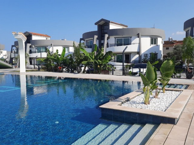 Alsancak 2+1 roof terrace flat for sale in the site