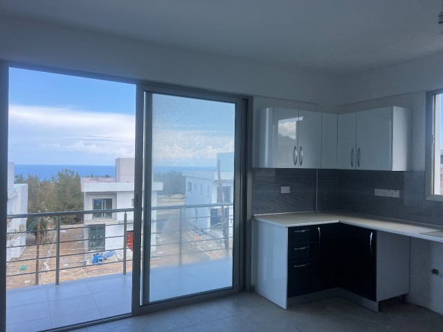 Catalkoy 1+1 unfurnished sea view flat for sale