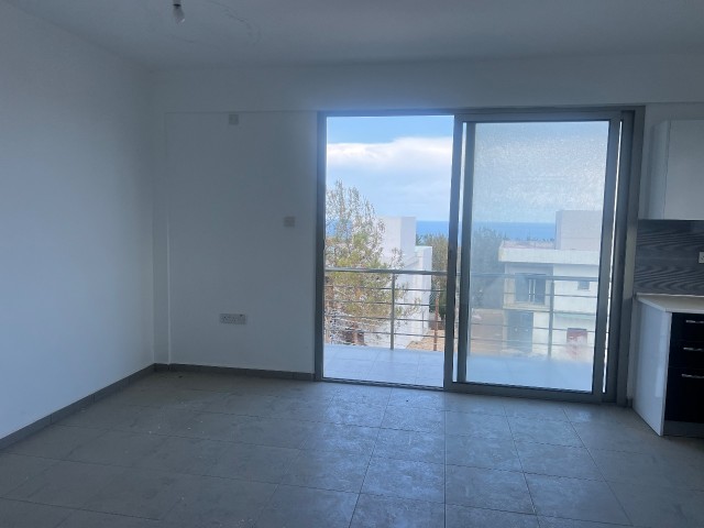 Catalkoy 1+1 unfurnished sea view flat for sale