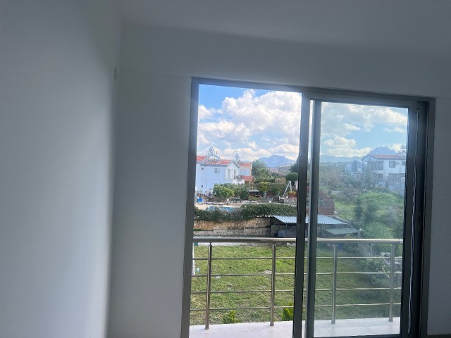 Catalkoy 1+1 unfurnished sea view flat for sale