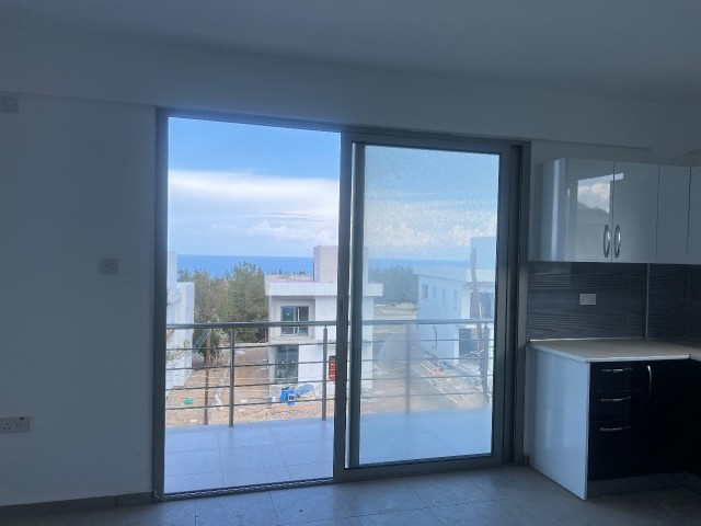 Catalkoy 1+1 unfurnished sea view flat for sale