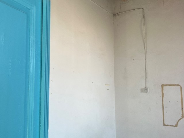 Village house in need of renovation in Alsancak is for sale