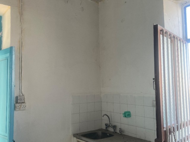 Village house in need of renovation in Alsancak is for sale