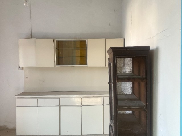 Village house in need of renovation in Alsancak is for sale