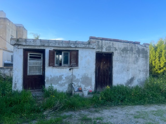 Village house in need of renovation in Alsancak is for sale