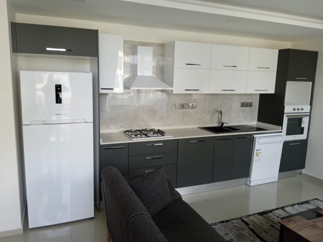 1+1 flat for sale in Kyrenia center, has outdoor pool, Turkish bath, massage, restaurant