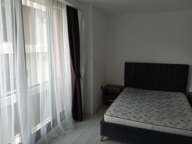 1+1 flat for sale in Kyrenia center, has outdoor pool, Turkish bath, massage, restaurant