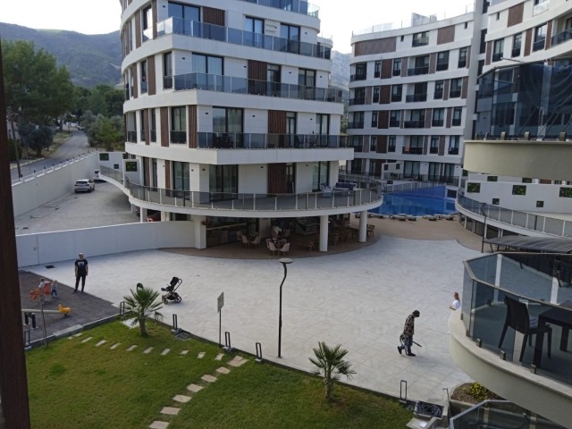 1+1 flat for sale in Kyrenia center, has outdoor pool, Turkish bath, massage, restaurant