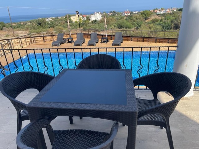 Karsıyaka 3+1 villa with private pool, quiet location with sea and mountain views.