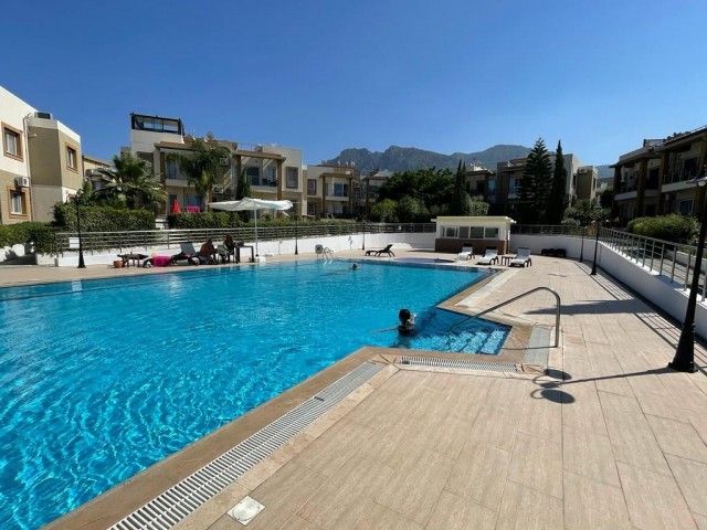 Furnished 1+1 Flat with a Large Terrace FOR SALE in a Site with a Pool in Alsancak Region!