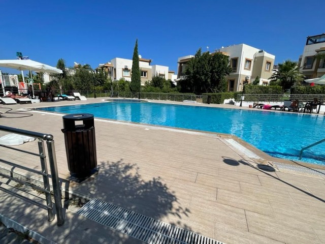 Furnished 1+1 Flat with a Large Terrace FOR SALE in a Site with a Pool in Alsancak Region!