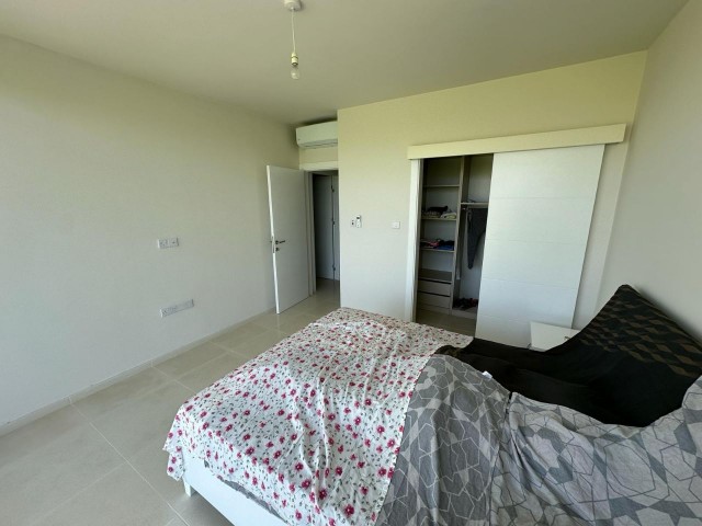 İSKELE'DE HARİKA DENİZ MANZARALI SATILIK 2+1 FUL EŞYALI APARTMAN DAİRESİ