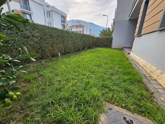 A SPECIAL FLAT FOR THOSE WHO ARE LOOKING FOR AN APARTMENT WITH A GARDEN! INVESTMENT OPPORTUNITY IN ALSANCAK LOTUS PARK!