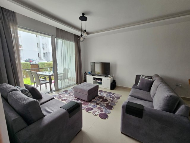 A SPECIAL FLAT FOR THOSE WHO ARE LOOKING FOR AN APARTMENT WITH A GARDEN! INVESTMENT OPPORTUNITY IN ALSANCAK LOTUS PARK!