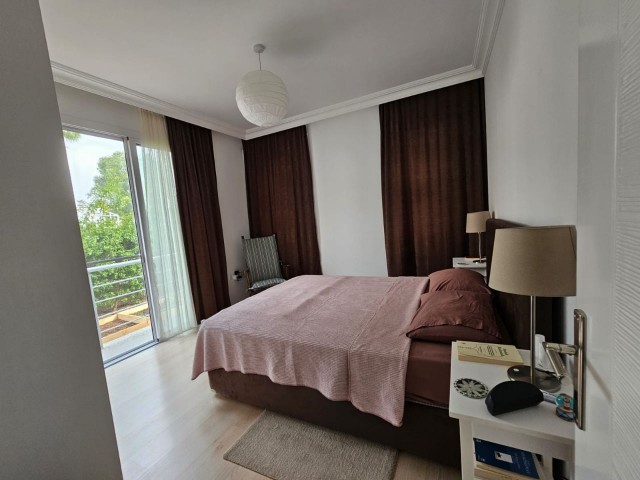 A SPECIAL FLAT FOR THOSE WHO ARE LOOKING FOR AN APARTMENT WITH A GARDEN! INVESTMENT OPPORTUNITY IN ALSANCAK LOTUS PARK!