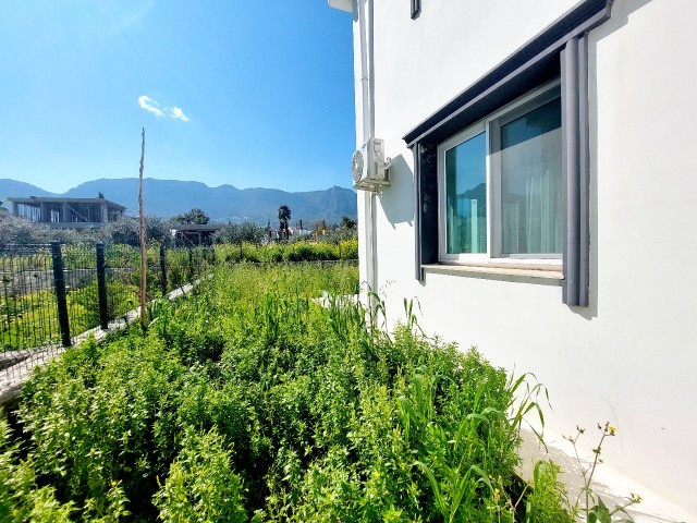 1+1 Wohnung mit Garten zum Verkauf in Girne Karaoğlanoğlu