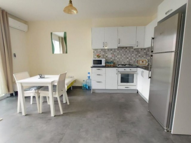 1+1 flat for sale in Kyrenia center with Turkish title