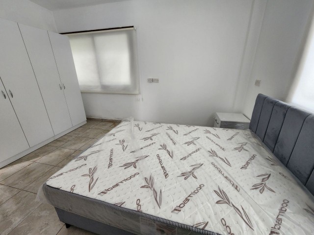 1+1 flat for rent in Alsancak, 200 m away from the sea, on the main road