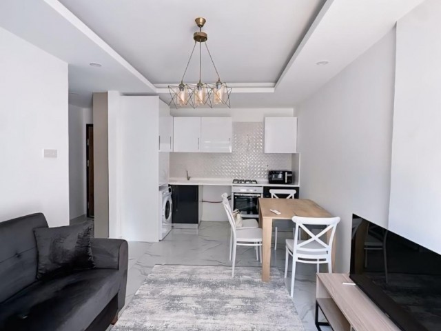 Alsancak'ta satılık full eşyalı modern 1+1 daire