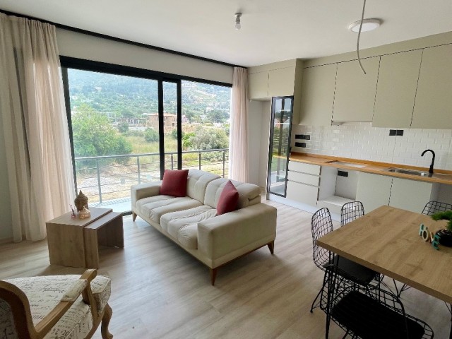 1+1 flat for sale in Karsiyaka with sea view
