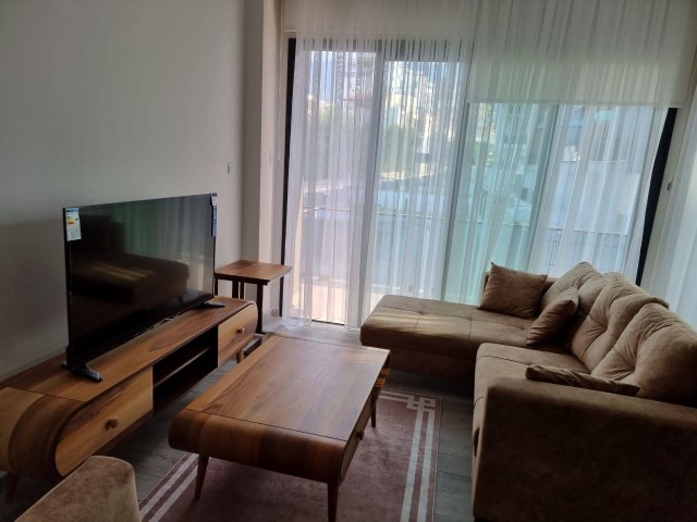 2+1 flat in a complex with a pool in the center of Kyrenia