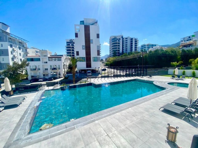 1+1 LUXURY APARTMENT FOR SALE IN A COMPLEX WITH COMMUNAL POOL IN THE CENTER OF CYPRUS GİRNE