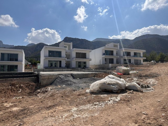 2+1 WOHNUNGEN ZUM VERKAUF IN ÇATALKÖY, KIRNE MIT BERG- UND MEERBLICK, GARTEN- UND TERRASSENMÖGLICHKEITEN