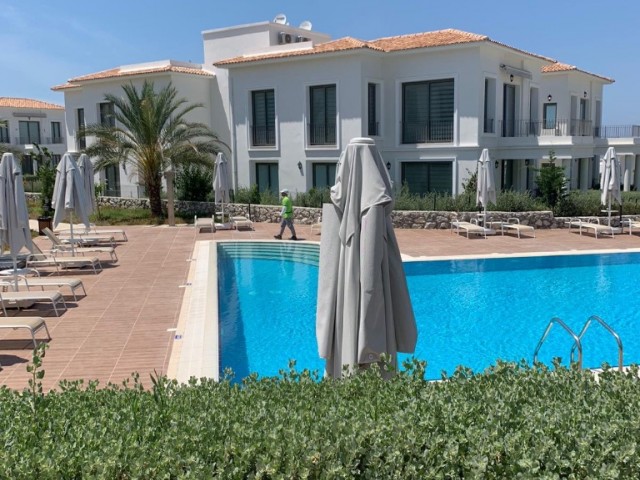 GIRNE ALSANCAKTA, CYPRUS TOWNHOUSES,SPACIOUS AND MODERN 2+1, PRIVATE GARDEN, ESCAPE BEACH 200M, SHARED POOL, VERY PRIVATE SITE WITH CLEAN AND WELL-MAINTAINED, CAFE ** 