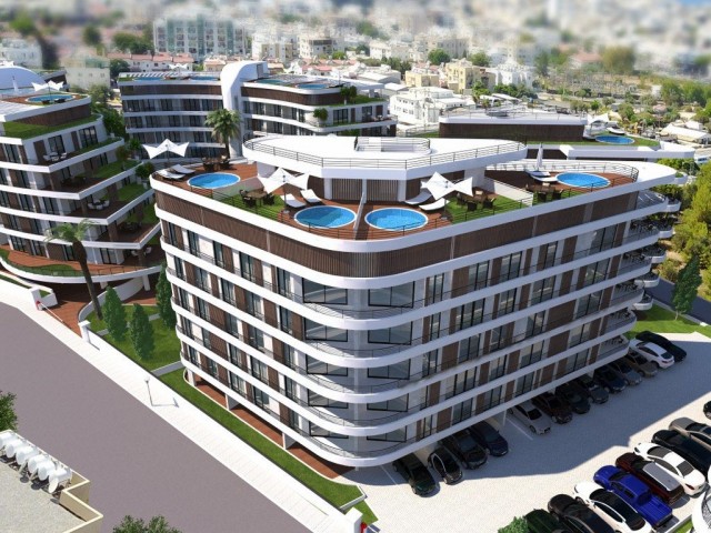 GİRNE MERKEZDE OTEL KONSEPTİNDE TASARLANAN  PROJESİNDE  2+1 /  3+1 SATILIK DAİRELER.İLK ÖDEME %20,KA