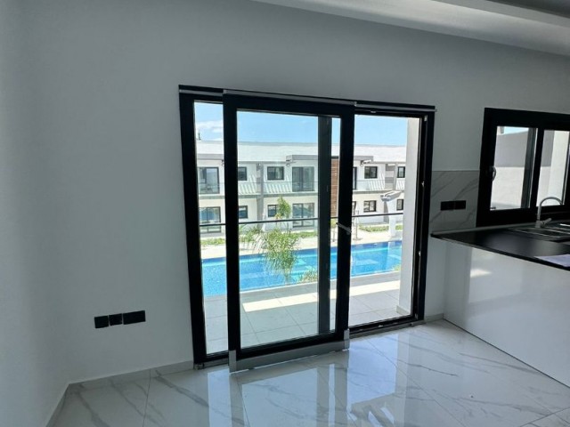 Girne Alsancak da Havuzlu Site İçerisinde  Satılık 1+1 Özel Teraslı Daire