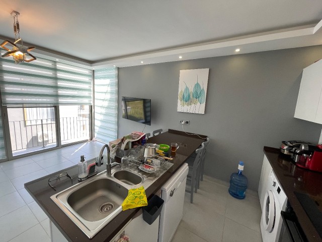 Fully Furnished, Sea and Mountain View, 1+1 Opportunity Penthouse Flat for Sale in Kyrenia Alsancak, in a Site with a Pool