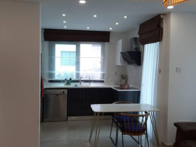 Fully Furnished 2+1 Opportunity Flat for Sale in Kyrenia Alsancak, in a Site with a Pool and a Garden