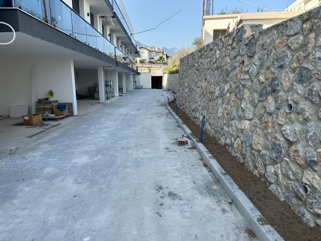 Opportunity 2+1 Completed Flats for Sale in a Site with a Pool in Alsancak, Kyrenia, with the Possibility of Payment in Installments