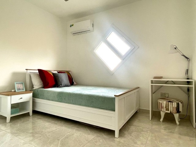 4+1 Opportunity Flat for Sale in Alsancak, Kyrenia, in a Centrally Located Site with a Garden and a Pool