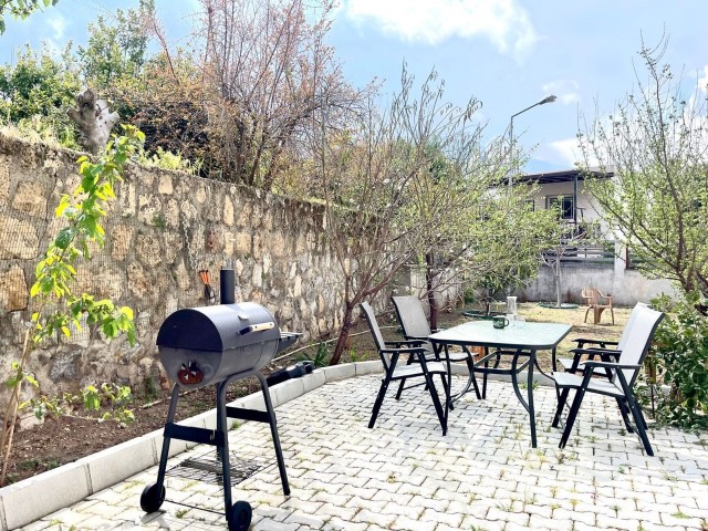 4+1 Opportunity Flat for Sale in Alsancak, Kyrenia, in a Centrally Located Site with a Garden and a Pool