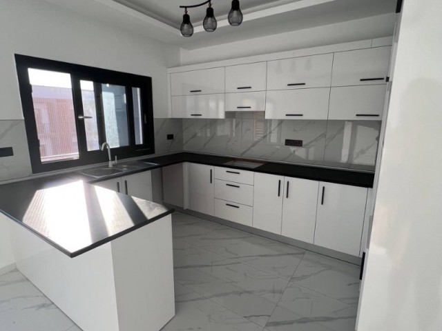 New 1+1 flat for sale with terrace in Kyrenia Alsancak region, within walking distance to the beaches