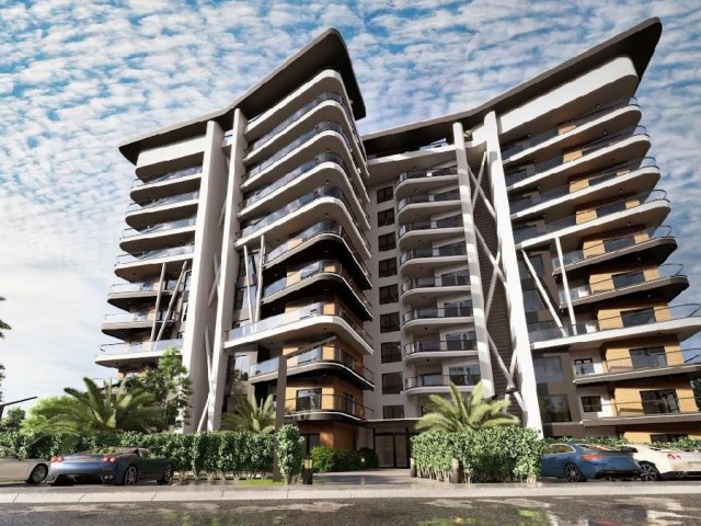 1+1 NEW LUXURY FLATS WITH SEA VIEW FOR SALE IN İSKELE LONG BEACH, WALKING DISTANCE TO THE SEA